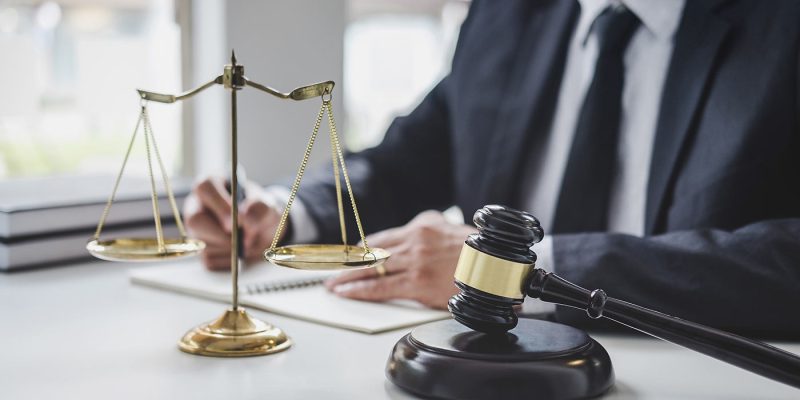 judge-gavel-with-justice-lawyers-counselor-in-suit-or-lawyer-working-with-contract-papers-on-a_t20_jLnxJv
